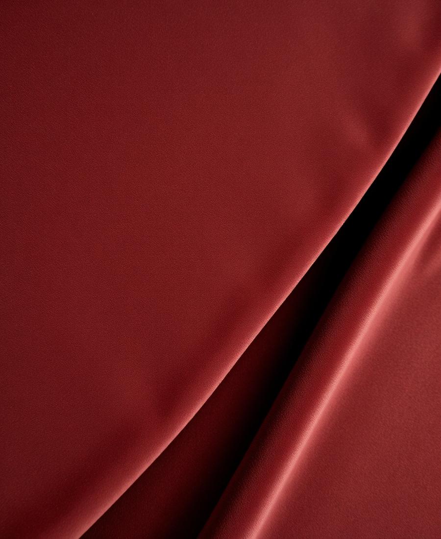 Deep red velvet fabric with rich pile and soft sheen, velvet fabric Dubai